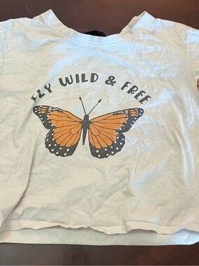 Wilfred White Tee with Orange & Black Butterfly Graphic